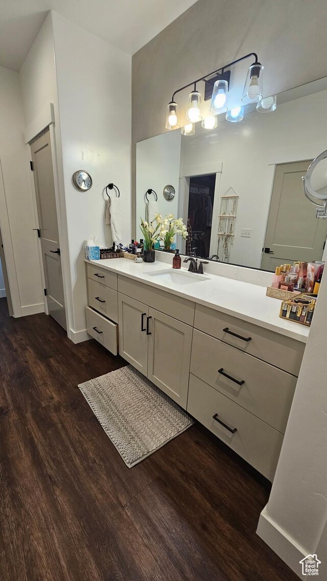 1268 E 300 S, Smithfield, UT 84335 - bathroom featuring wood finished floors and vanity