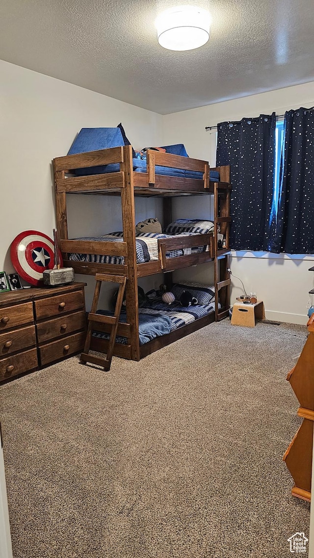 1268 E 300 S, Smithfield, UT 84335 - carpeted bedroom featuring a textured ceiling