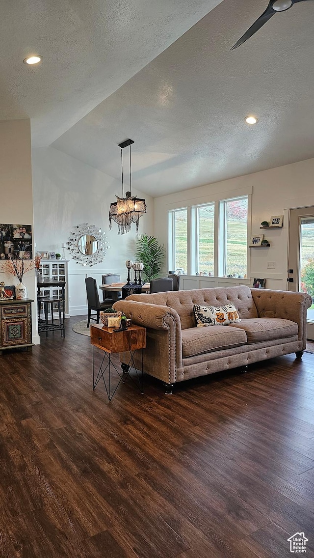 1268 E 300 S, Smithfield, UT 84335 - living area with dark wood-style flooring, a textured ceiling, recessed lighting, a chandelier, and lofted ceiling