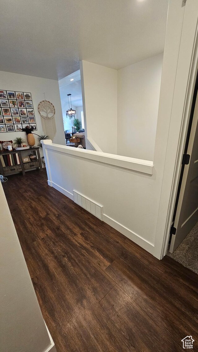 1268 E 300 S, Smithfield, UT 84335 - hallway featuring wood finished floors, a chandelier, and recessed lighting