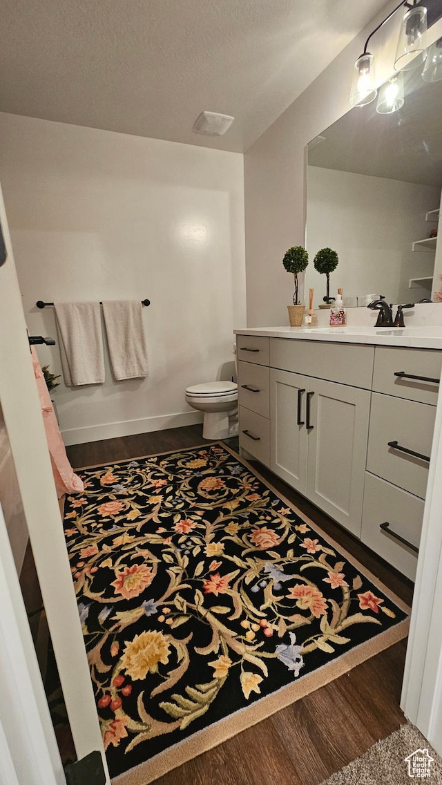 1268 E 300 S, Smithfield, UT 84335 - full bath featuring wood finished floors and vanity