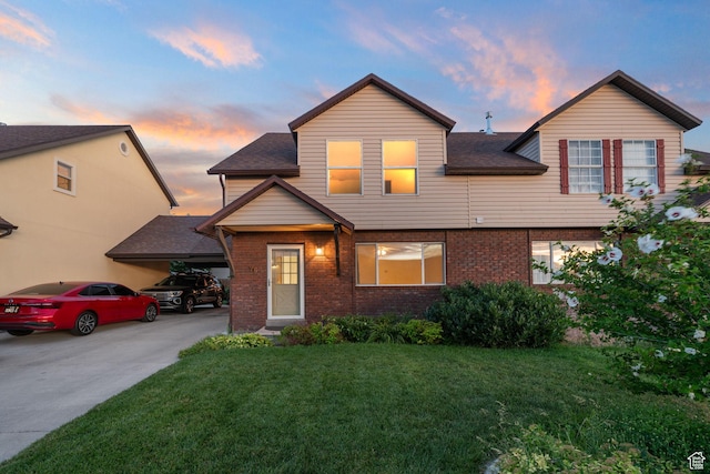 78 E 1450 S, Orem, UT 84058 - view of front of home with a yard, brick siding, and a shingled roof
