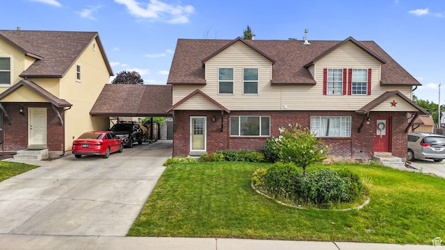 78 E 1450 S, Orem, UT 84058 - view of front facade featuring brick siding, concrete driveway, entry steps, and a shingled roof