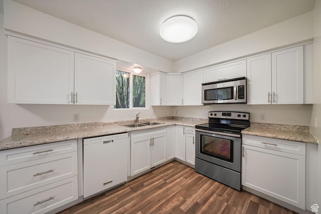 78 E 1450 S, Orem, UT 84058 - kitchen with stainless steel appliances, white cabinets, and dark wood-style floors