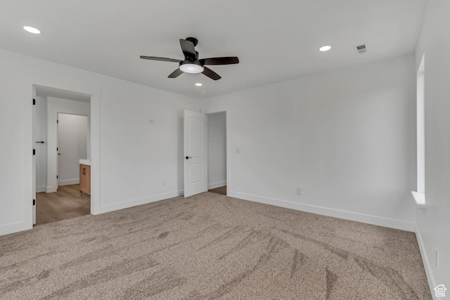 13749 S Crimson Patch Way, Riverton, UT 84096 - unfurnished bedroom featuring light carpet, recessed lighting, connected bathroom, and a ceiling fan