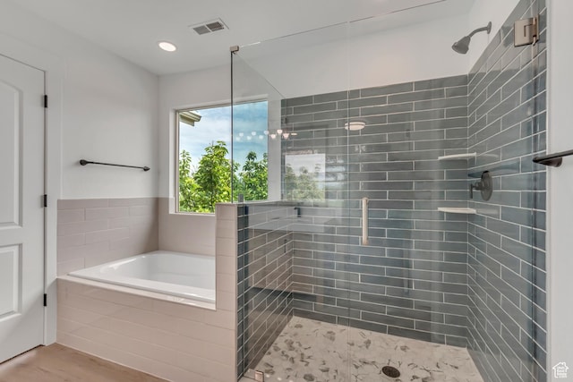 13749 S Crimson Patch Way, Riverton, UT 84096 - full bath featuring a shower stall, a bath, and wood finished floors