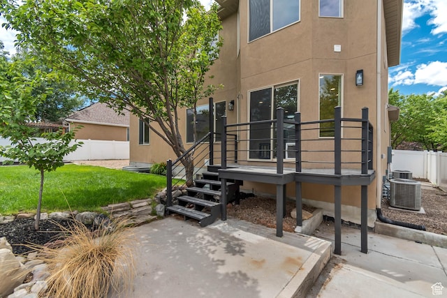 13749 S Crimson Patch Way, Riverton, UT 84096 - back of property with a patio and stucco siding