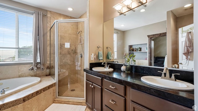 13994 S Stone Dr E, Draper, UT 84020 - bathroom with a garden tub, a stall shower, double vanity, plenty of natural light, and recessed lighting