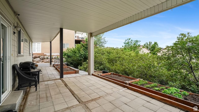 13994 S Stone Dr E, Draper, UT 84020 - view of patio with a garden