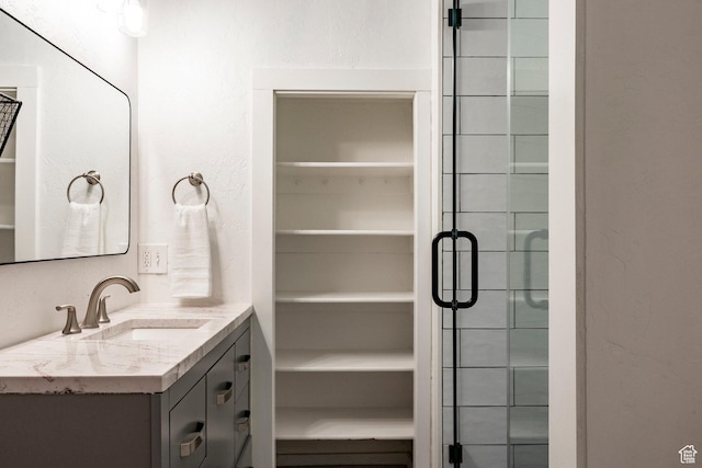 416 Marsac Ave, Park City, UT 84060 - full bathroom with vanity, a shower stall, and a spacious closet