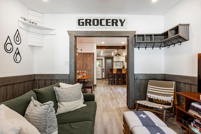 416 Marsac Ave, Park City, UT 84060 - living area with wainscoting, wooden walls, and light wood-type flooring
