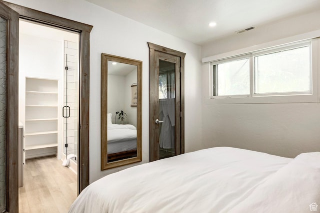 416 Marsac Ave, Park City, UT 84060 - bedroom featuring light wood-type flooring, a spacious closet, a closet, and recessed lighting