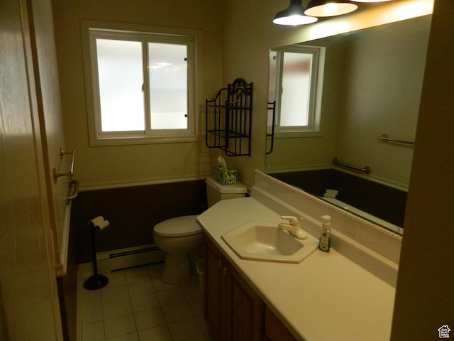 4222 S Edward Dr, Holladay, UT 84124 - bathroom featuring a baseboard heating unit, vanity, and tile patterned floors