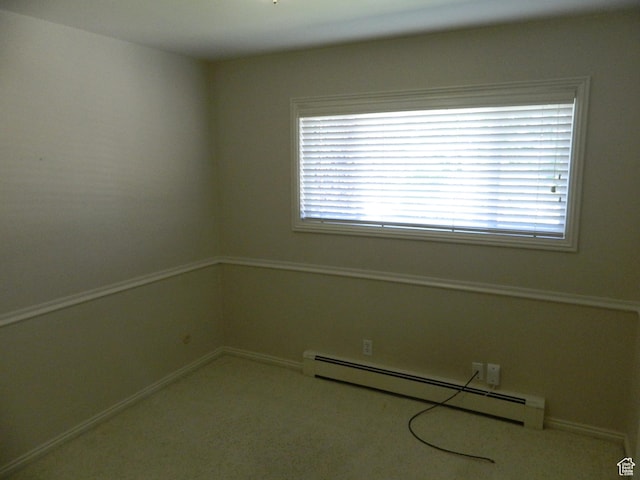 4222 S Edward Dr, Holladay, UT 84124 - spare room with a baseboard radiator, plenty of natural light, and carpet