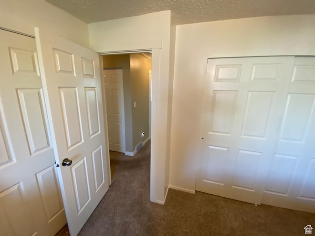 6690 S 3270 W, West Jordan, UT 84084 - unfurnished bedroom with dark carpet and a closet