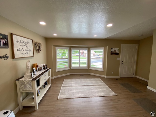 6690 S 3270 W, West Jordan, UT 84084 - foyer with wood finished floors, recessed lighting, and a textured ceiling