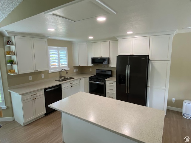 6690 S 3270 W, West Jordan, UT 84084 - kitchen featuring refrigerator with ice dispenser, dishwasher, stainless steel gas range oven, black microwave, and light wood-type flooring