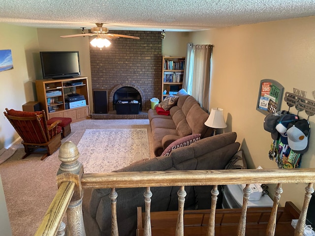 6690 S 3270 W, West Jordan, UT 84084 - living area featuring ceiling fan, a textured ceiling, a brick fireplace, and carpet flooring
