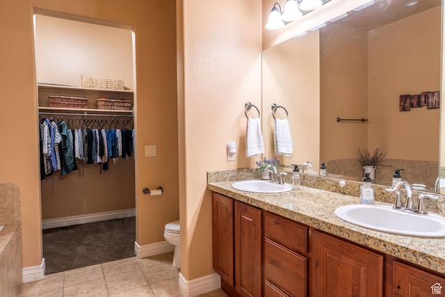 1959 W Golden Pond Way S, Orem, UT 84059 - bathroom with double vanity, tile patterned flooring, and a walk in closet
