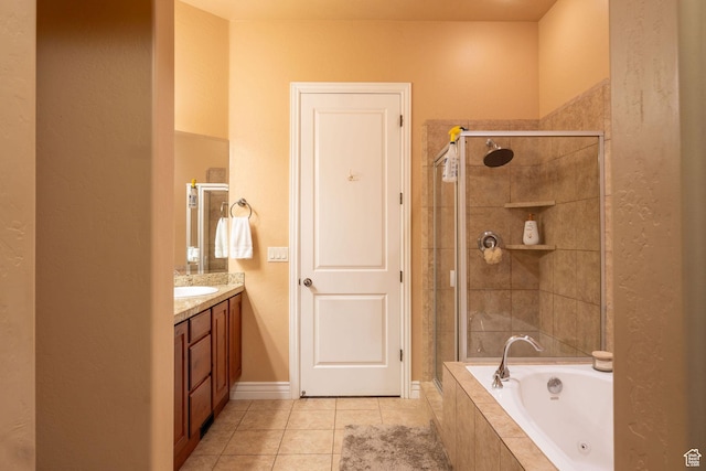 1959 W Golden Pond Way S, Orem, UT 84059 - bathroom with vanity, a garden tub, a stall shower, and tile patterned floors