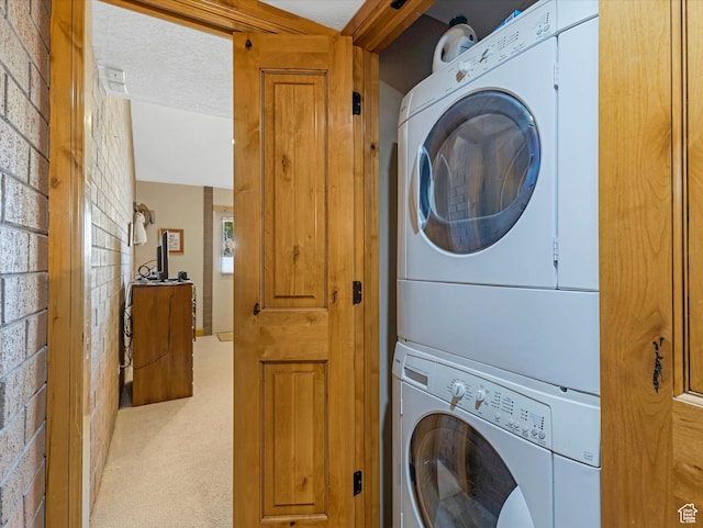 1679 Captain Molly Dr, Park City, UT 84060 - laundry room with stacked washing machine and dryer and light colored carpet