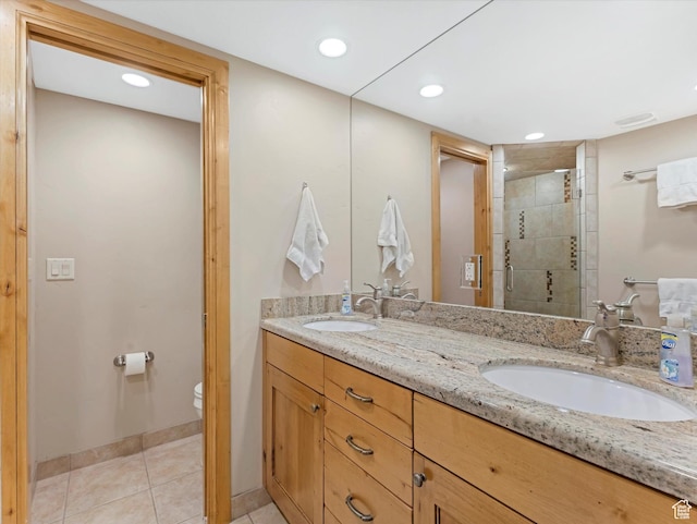 1679 Captain Molly Dr, Park City, UT 84060 - full bathroom featuring double vanity, tile patterned flooring, recessed lighting, and tiled shower