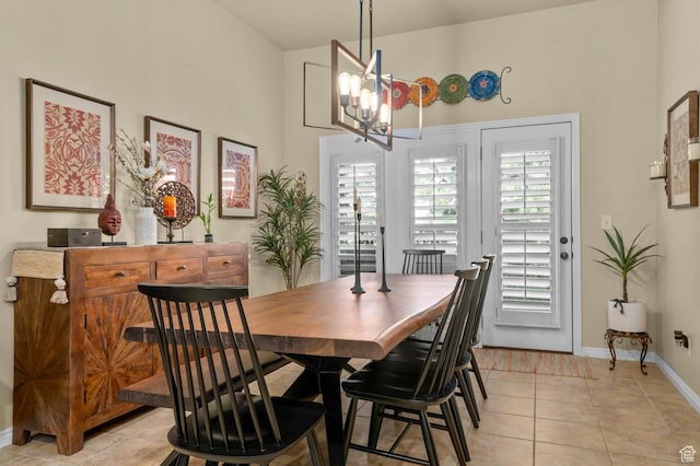 14858 S Ox Cart Ln, Draper, UT 84020 - dining area with a chandelier, light tile patterned floors, and a high ceiling