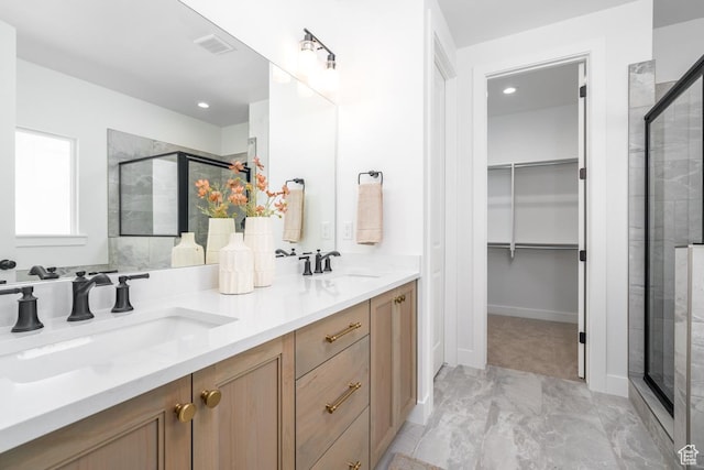 2960 N 1080 W, Lehi, UT 84043 - bathroom featuring marble finish flooring, a shower stall, a walk in closet, double vanity, and recessed lighting