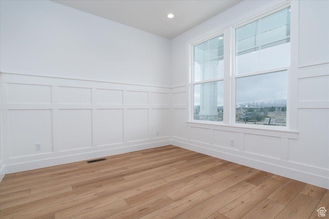 2960 N 1080 W, Lehi, UT 84043 - unfurnished room with a decorative wall, light wood-type flooring, wainscoting, and recessed lighting