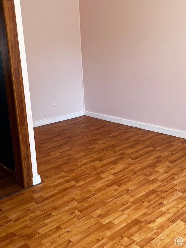 1145 S Navajo St, Salt Lake City, UT 84104 - spare room with light wood-style flooring and baseboards