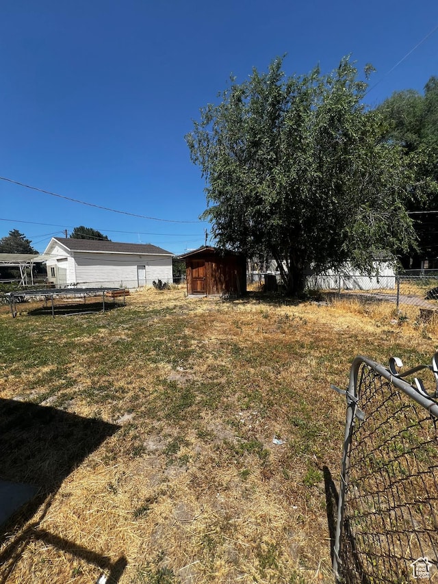 1145 S Navajo St, Salt Lake City, UT 84104 - view of yard with a storage unit