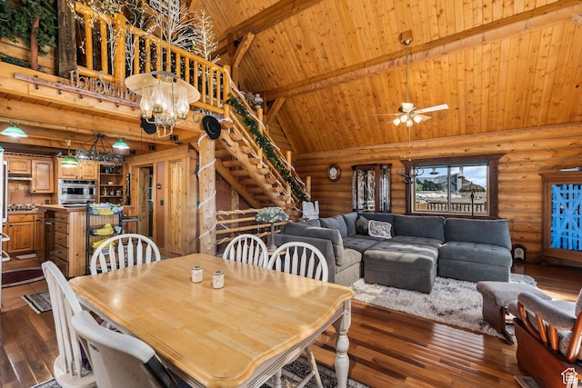 214 W Shinarump Cir, Leeds, UT 84746 - dining room with log walls, a wooden ceiling with exposed beams, dark wood-style floors, high vaulted ceiling, and stairs