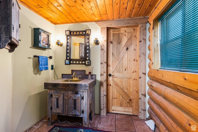 214 W Shinarump Cir, Leeds, UT 84746 - bathroom with wood ceiling, vanity, and tile patterned flooring