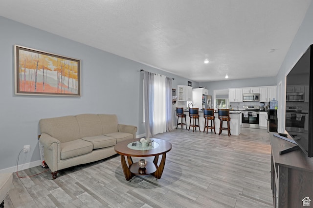 2217 Monroe Blvd, Ogden, UT 84401 - living area with light wood-style floors