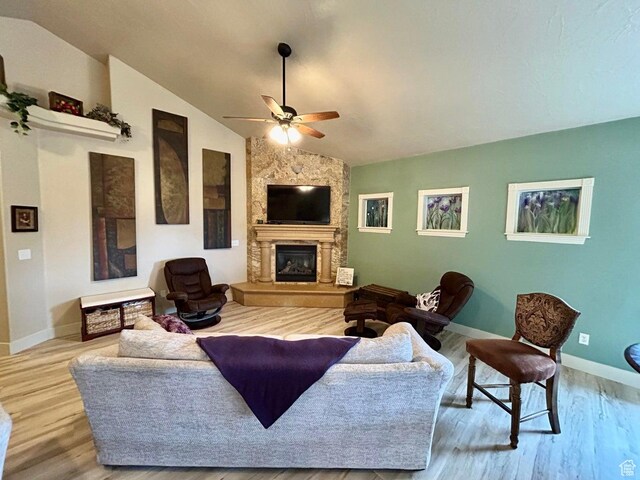 4140 W 975 S, Cedar City, UT 84720 - living area with a ceiling fan, a large fireplace, lofted ceiling, and wood finished floors