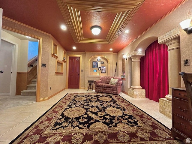 4140 W 975 S, Cedar City, UT 84720 - foyer entrance with decorative columns, stairs, light tile patterned flooring, ornamental molding, and a raised ceiling