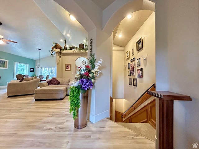 4140 W 975 S, Cedar City, UT 84720 - living room with lofted ceiling, light wood finished floors, ceiling fan, arched walkways, and recessed lighting