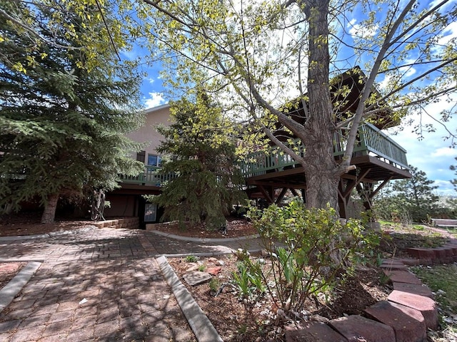 4140 W 975 S, Cedar City, UT 84720 - view of front of property with a deck, stucco siding, and a patio area