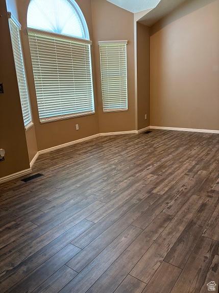 1579 W 2050 N, Clinton, UT 84015 - spare room with dark wood-style flooring and baseboards