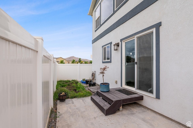 8687 N Oakmont Aly, Eagle Mountain, UT 84005 - fenced backyard featuring a patio area