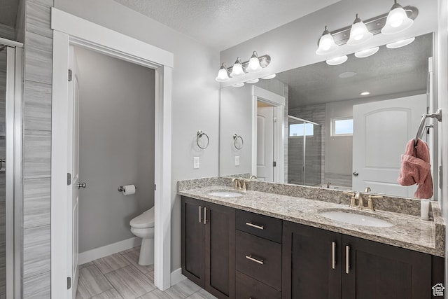 8687 N Oakmont Aly, Eagle Mountain, UT 84005 - full bath featuring a shower stall, double vanity, and a textured ceiling
