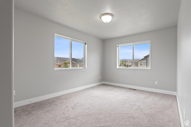 8687 N Oakmont Aly, Eagle Mountain, UT 84005 - unfurnished room with carpet floors and a textured ceiling