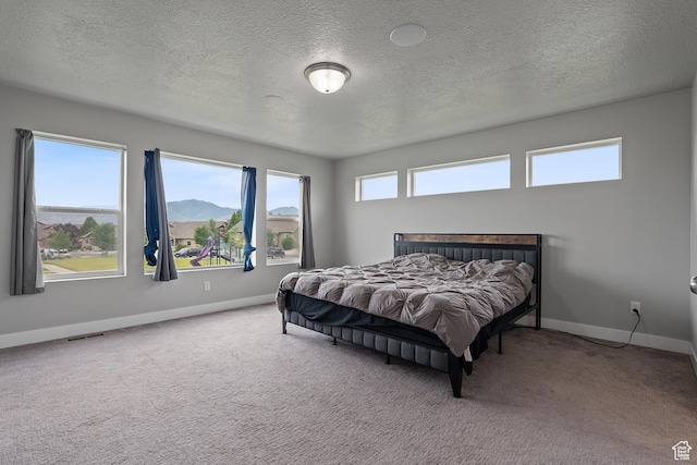 8687 N Oakmont Aly, Eagle Mountain, UT 84005 - bedroom featuring carpet flooring and a textured ceiling