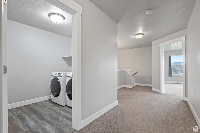 8687 N Oakmont Aly, Eagle Mountain, UT 84005 - laundry room with a textured ceiling and washing machine and dryer
