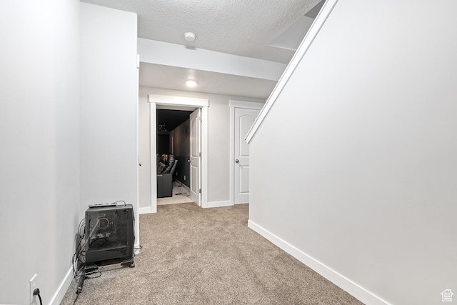 8687 N Oakmont Aly, Eagle Mountain, UT 84005 - hallway featuring carpet flooring and a textured ceiling