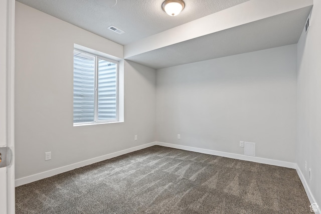 8687 N Oakmont Aly, Eagle Mountain, UT 84005 - unfurnished room with dark carpet and a textured ceiling