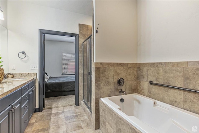 3944 W Sage Blossom Way S, Jordan, UT 84009 - ensuite bathroom featuring vanity, a garden tub, and a stall shower