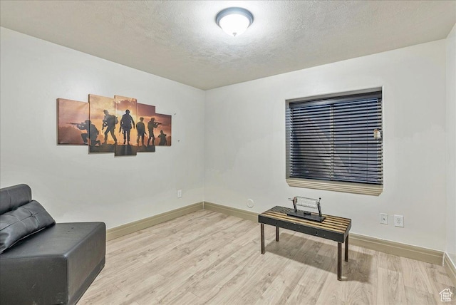 3944 W Sage Blossom Way S, Jordan, UT 84009 - sitting room featuring wood finished floors and a textured ceiling