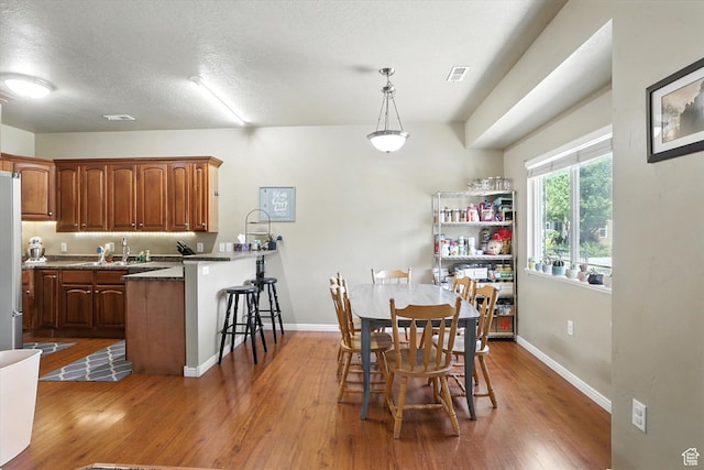 1492 N 565 W Unit 101, Logan, UT 84341 - dining room with wood finished floors