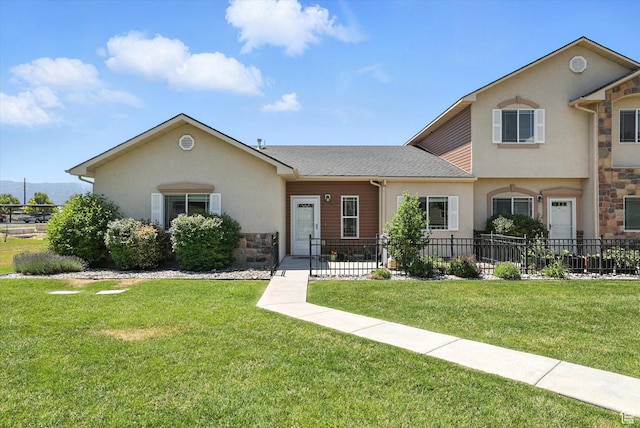 1492 N 565 W Unit 101, Logan, UT 84341 - view of front of house featuring stone siding, stucco siding, and a shingled roof